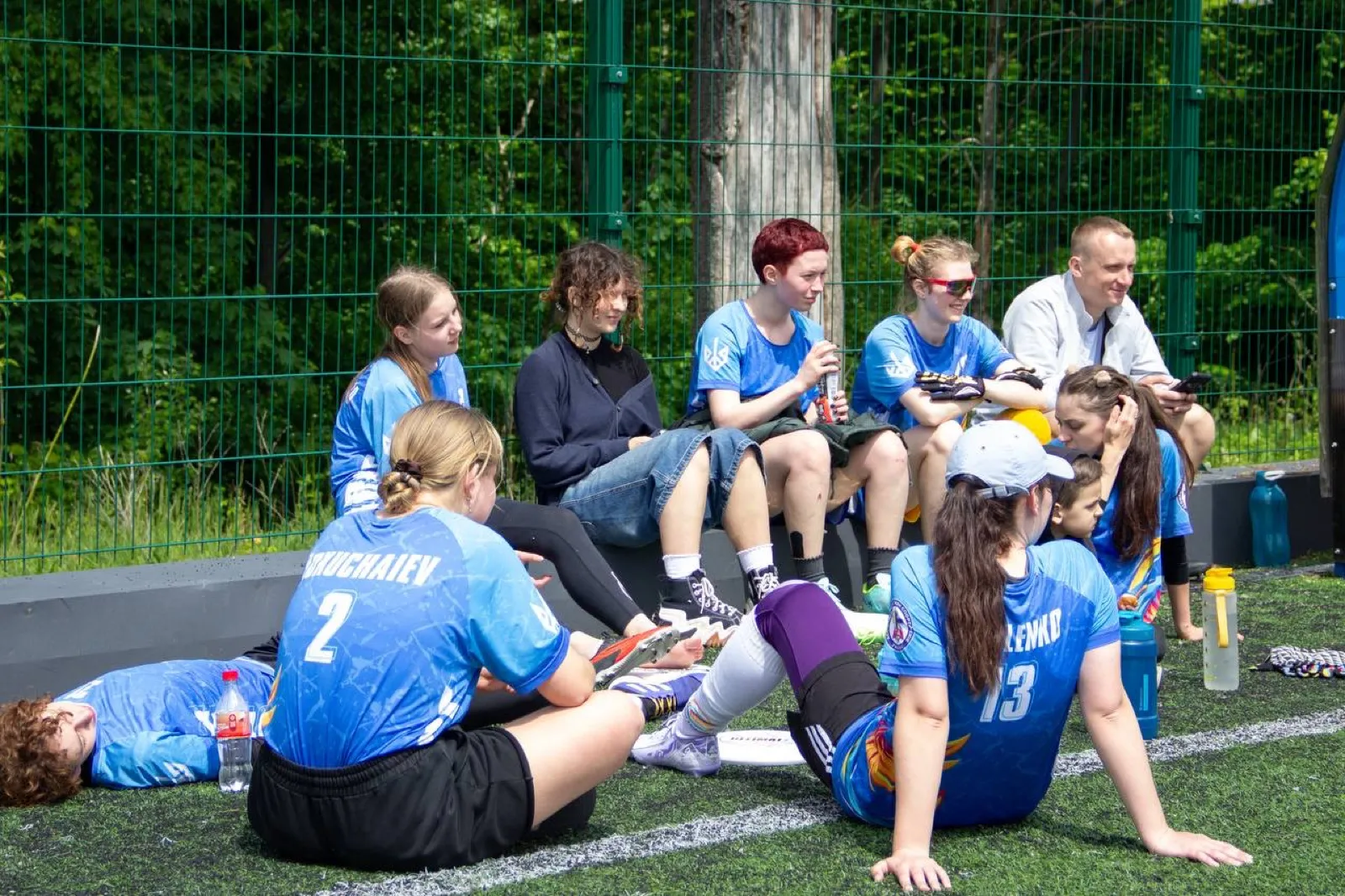 Players resting between points on the grass.